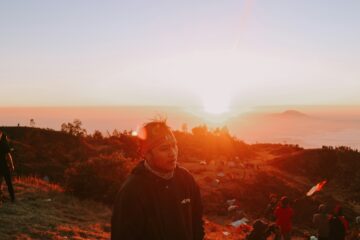 men climbing a mountain