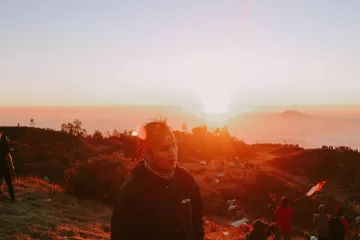 men climbing a mountain